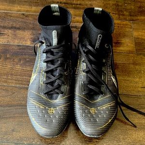 lightly used Nike Superfly 8 Academy Firm Ground Soccer cleats.